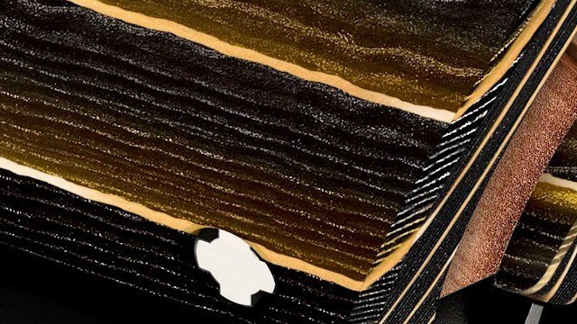 Close-up of gold-tone forged carbon layers